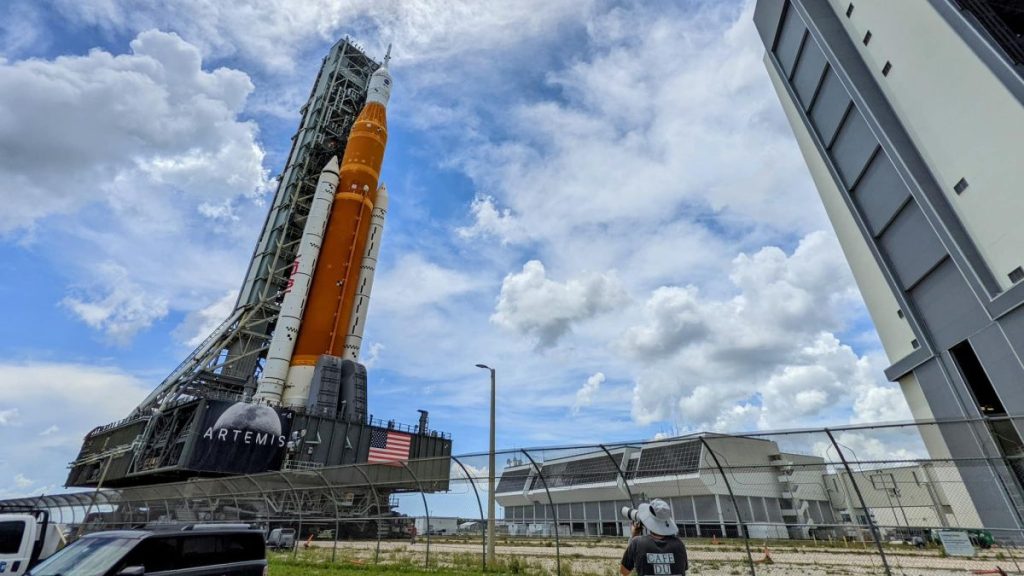 Artemis 1 rocket beside Vehicle Assembly Building at NASA