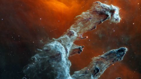 ジェームズ・ウェッブ宇宙望遠鏡の新しい画像は、中赤外光で創造の柱を示しています。